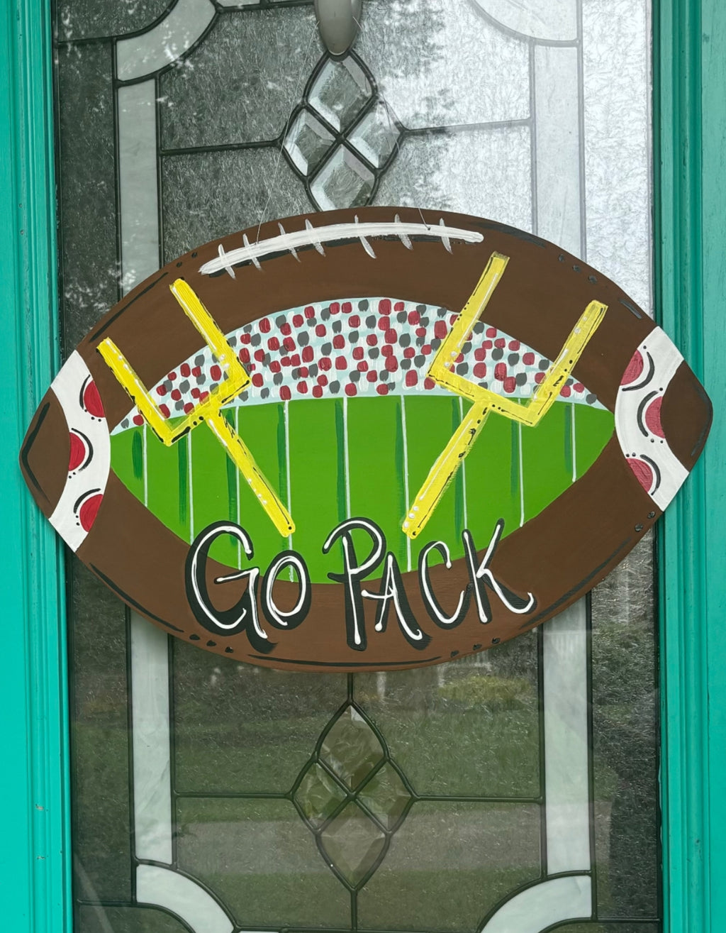 Order your Team Football Door Hanger Now!